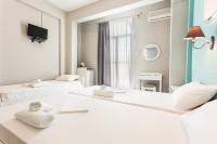 Posteľ alebo postele v izbe v ubytovaní Protopapas Rooms