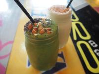 two smoothies in jars sitting on a table at Hotel Villa Hakuba by HHG in Hakuba