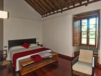 Postel nebo postele na pokoji v ubytování Hotel Rural El Mondalón