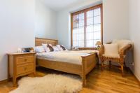 Posteľ alebo postele v izbe v ubytovaní Apartamenty Tatrzańskie Turnie