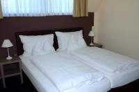 Postel nebo postele na pokoji v ubytování Hotel Destination 21