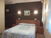 Hostal Lidoにあるベッド