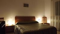 A bed or beds in a room at Casablanca
