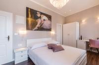 Posteľ alebo postele v izbe v ubytovaní Theatre of Dreams Rooms