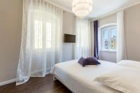 Posteľ alebo postele v izbe v ubytovaní Theatre of Dreams Rooms