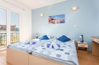 Posteľ alebo postele v izbe v ubytovaní Apartments Ivanović