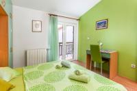 Posteľ alebo postele v izbe v ubytovaní Apartments Ivanović