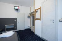 Łóżko lub łóżka w pokoju w obiekcie Hotel Rubino
