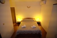 Posteľ alebo postele v izbe v ubytovaní Apartmani Svemir