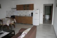Kuchyň nebo kuchyňský kout v ubytování Apartmani Huljev