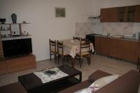 Kuchyň nebo kuchyňský kout v ubytování Apartmani Huljev