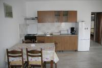 Kuchyň nebo kuchyňský kout v ubytování Apartmani Huljev