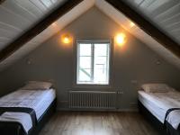 Postel nebo postele na pokoji v ubytování Old Town Luxury Apartment Akureyri