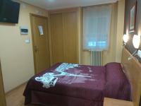Hostal Lidoにあるベッド