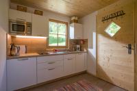 A kitchen or kitchenette at Chalet Auszeit
