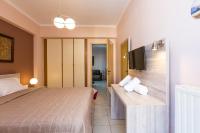 Posteľ alebo postele v izbe v ubytovaní Cozy Guest House