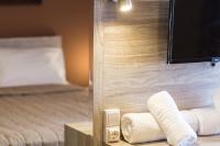 Posteľ alebo postele v izbe v ubytovaní Cozy Guest House