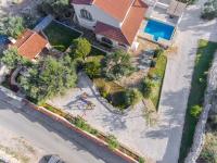 an overhead view of a house with a yard at Villa Sonnhaus in Marina