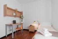 A bed or beds in a room at Camplus Lambrate Casa per Ferie