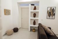 A seating area at Via Vittorio Emanuele Apartment