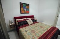 A bed or beds in a room at Via Vittorio Emanuele Apartment