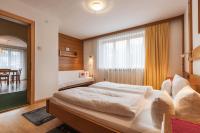 A bed or beds in a room at Landhaus Kreuz