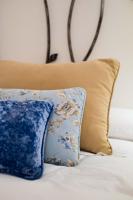 A bed or beds in a room at La Casa de la Vieja - Rustic & Charming Appartments