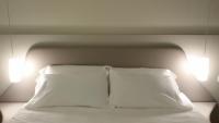 Posteľ alebo postele v izbe v ubytovaní Hotel Borgovico