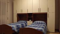 A bed or beds in a room at Casablanca