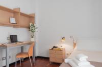 A bed or beds in a room at Camplus Lambrate Casa per Ferie