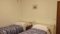 A bed or beds in a room at Casablanca