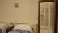 A bed or beds in a room at Casablanca