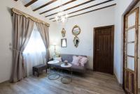 A seating area at La Casa de la Vieja - Rustic & Charming Appartments