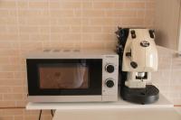 A kitchen or kitchenette at Amira Luxury Apartments