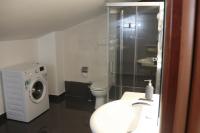 A bathroom at Amira Luxury Apartments