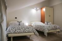 A bed or beds in a room at Amira Luxury Apartments
