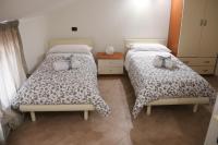 A bed or beds in a room at Amira Luxury Apartments