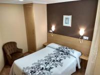 Hostal Lidoにあるベッド