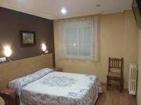 Hostal Lidoにあるベッド