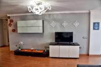 Televízia a/alebo spoločenská miestnosť v ubytovaní WonderStays Apartamento La Jabega