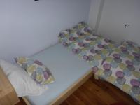 Katil atau katil-katil dalam bilik di Gite Sent Martin