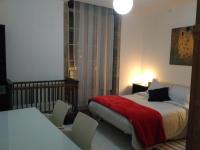 A bed or beds in a room at Fogar de Breogan
