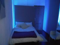 A bed or beds in a room at Fogar de Breogan