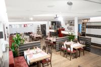 Posezení v ubytování Gasthaus und Pension Zur Linde