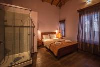 Postel nebo postele na pokoji v ubytování PRIVATE Sapphiros Villa