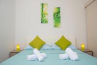 Posteľ alebo postele v izbe v ubytovaní Apartment Ariana