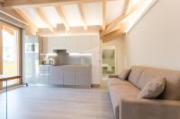 A kitchen or kitchenette at La Giostra Home Apartments