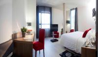 Posteľ alebo postele v izbe v ubytovaní Hotel K10