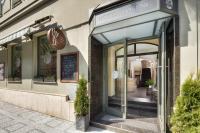 a store front with a sign on the door at Hotel Florenc in Prague