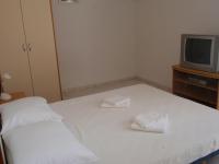 Postel nebo postele na pokoji v ubytování Apartmani Anđelka